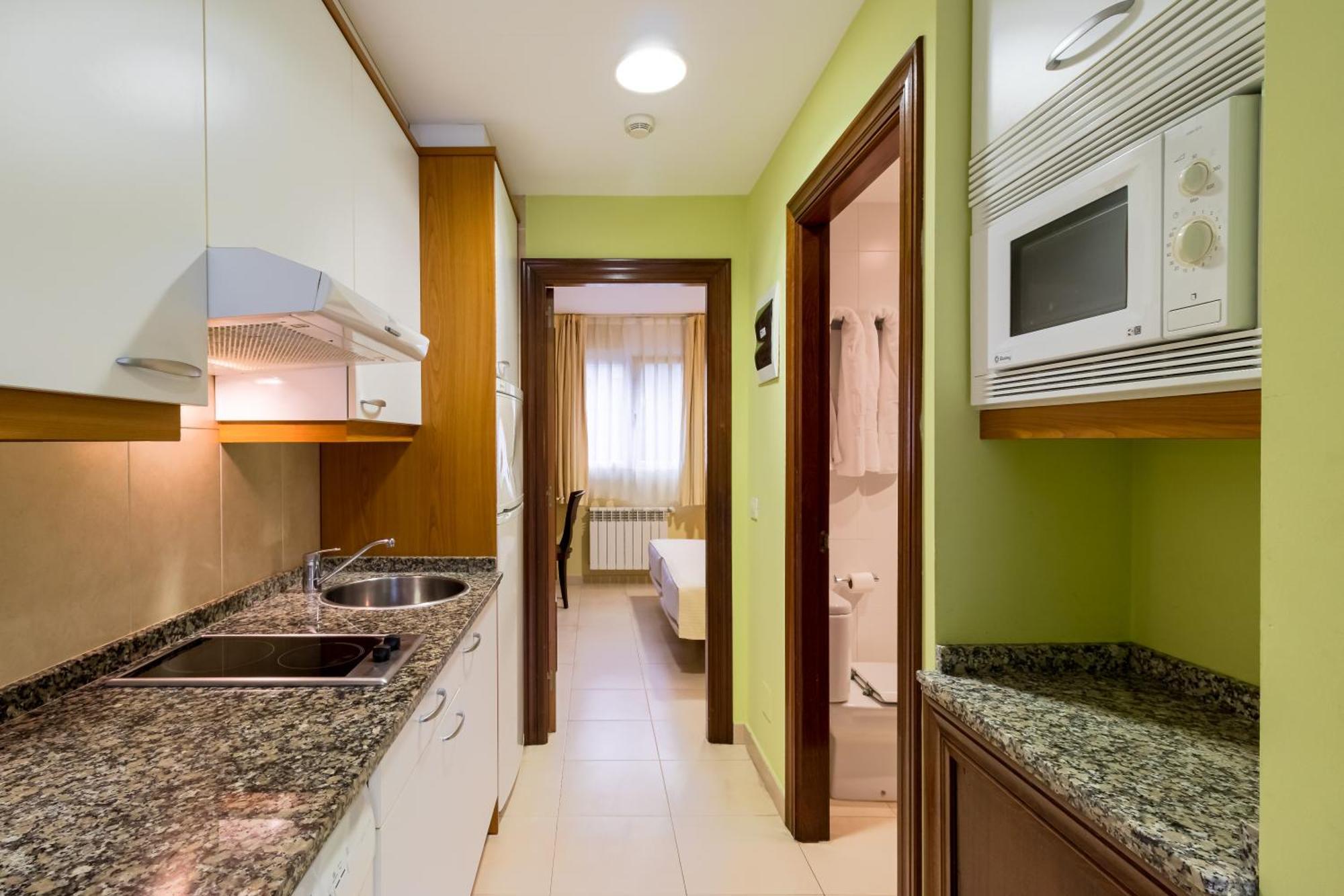 Apartamentos Silken Playa De Toro Льянес Экстерьер фото